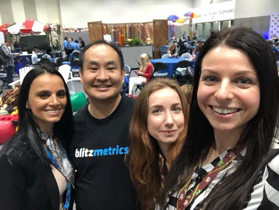 Nadia with colleagues at a conference networking session