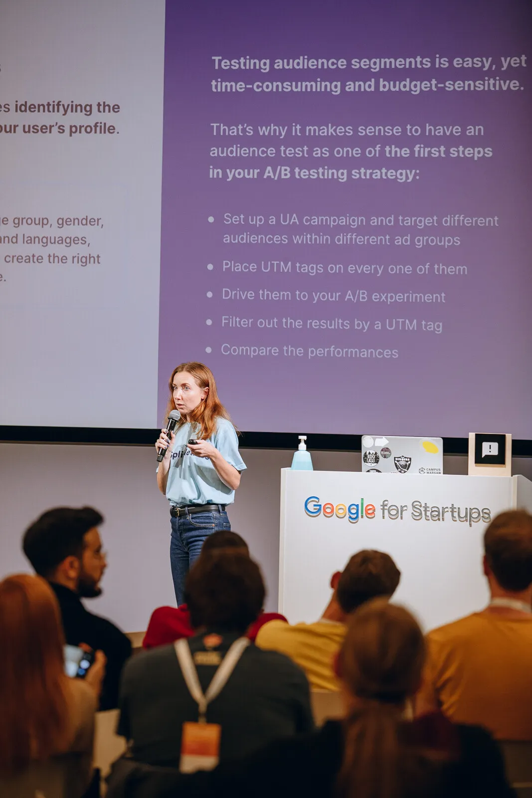Nadia on stage at Gamecamp with the Google for Startups podium